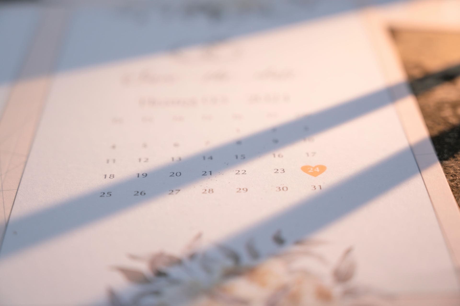 Calendar with a heart marking a wedding date — checking Iowa wedding dates for 2026 and 2027